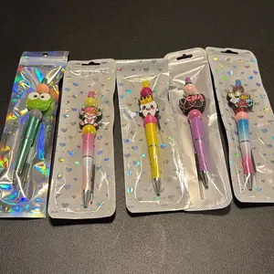 5 beaded items. Pick from pen, keychain, or badge reel