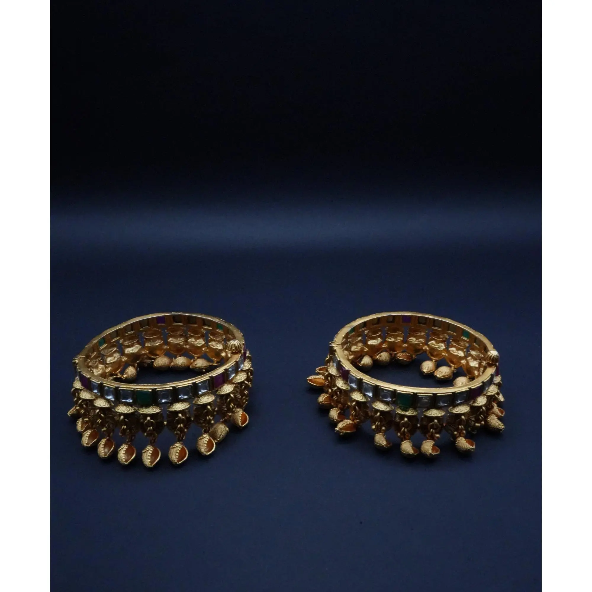 Antique Gold-Plated Kundan Bangles with Charms