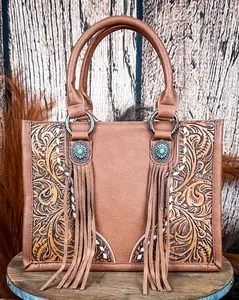 Canyon Nights Tooled Fringe Satchel in Brown by Montana West
