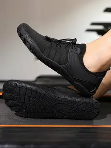A pair of indoor training shoes, yoga shoes, Footwear Athletic Trainer. Features breathable mesh upper and non-slip rubber sole. Unisex design. Suitable for treadmill, jumping rope, weightlifting, deadlifts, bench press, and other indoor exercises.