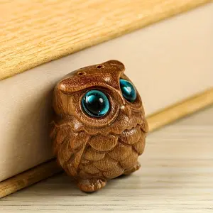 1pc handcrafted wooden owl statue, featuring striking blue eyes - charming collectible in cartoon style - versatile indoor and outdoor decorative item - antique finish keychain accessory, owl home decoration