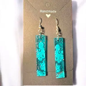 22) Transparent Glittery Blue Octopus Earrings