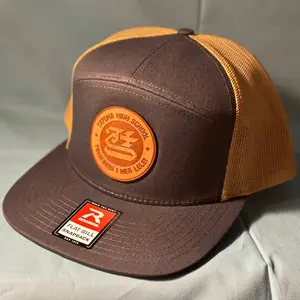 Tafuna Warriors 7 Panel Trucker Hat with Leather Patch Logo - Stylish and Durable Fashion Accessory for All Occasions