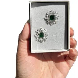 Emerald Elegance Halo Studs - Rich Deep Green Center Stone in Sleek Rectangular Cut with Sparkling Crystals Polished Silver-Tone Finish Perfect for Weddings and Festive Occasions
