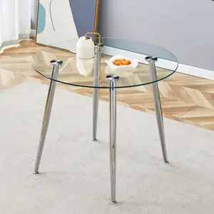 Round dining table with glass top, silver metal legs, exquisite life, starting from the details, the silver legs show an extraordinary texture, which is the finishing touch to your home wayfair  furniture