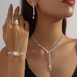 An elegant jewelry set containing a pair of earrings and a necklace, featuring silver-plated crystal fashion teardrop-shaped party decorations, making it a refined birthday gift