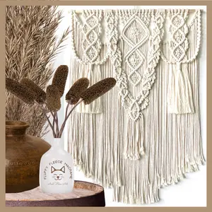 Large neutral colored layered macrame wall hanging. Perfect for many gift giving occasions Housewarming such as Birthday, Christmas, housewarming 24” W x 34” long Artwork for Decorative home decor accent. Perfect for an entryway, living room, or bedroom