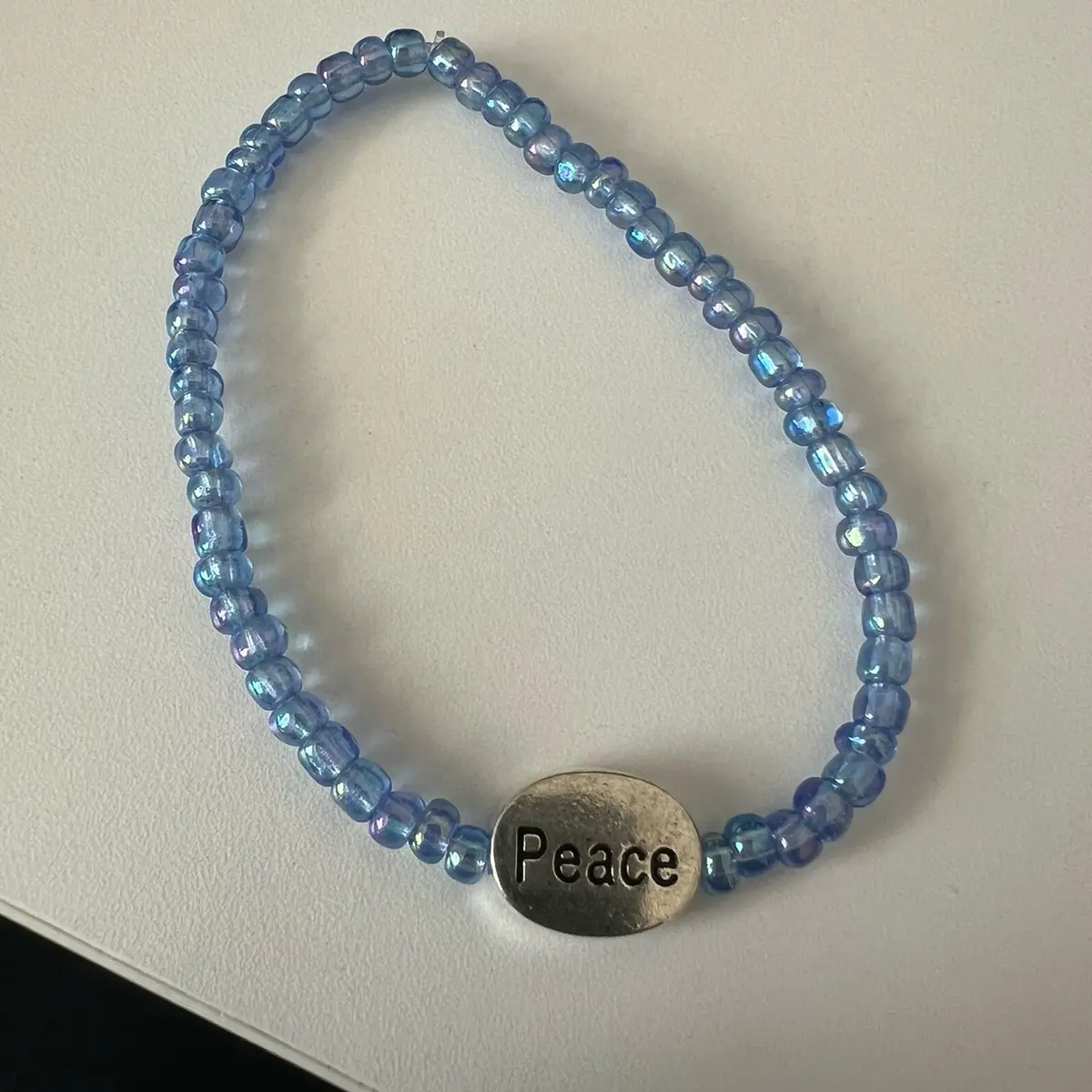 Blue movement peace bracelet