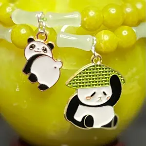 Geeen Jade bracelet with panda charms. 2 piece set