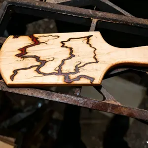 small spicy wood and resin charcuterie board