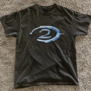 Halo 2 Vintage Video Game T-Shirt, Classic Halo 2 Logo Graphic Tee, Rare 2000s Gaming Shirt, Retro 2000s Halo 2 Logo Shirt, Rare Halo Collectors Edition T-Shirt, Nostalgic Video Game Logo Tee, Cotton Blend Casual Gamer Shirt, Unisex Halo 2 Gaming T-Shirt