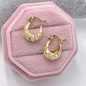 e01 Small Hoops Gold-Toned Textured Design Earrings for Everyday Wear