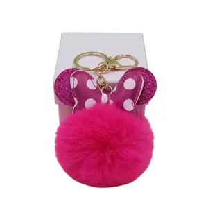 PU Bowknot Ball Fluffy Fur Pom Pom Keychain for Women Handbag Charm with Mouse Ears Design and Gold Tone Ring