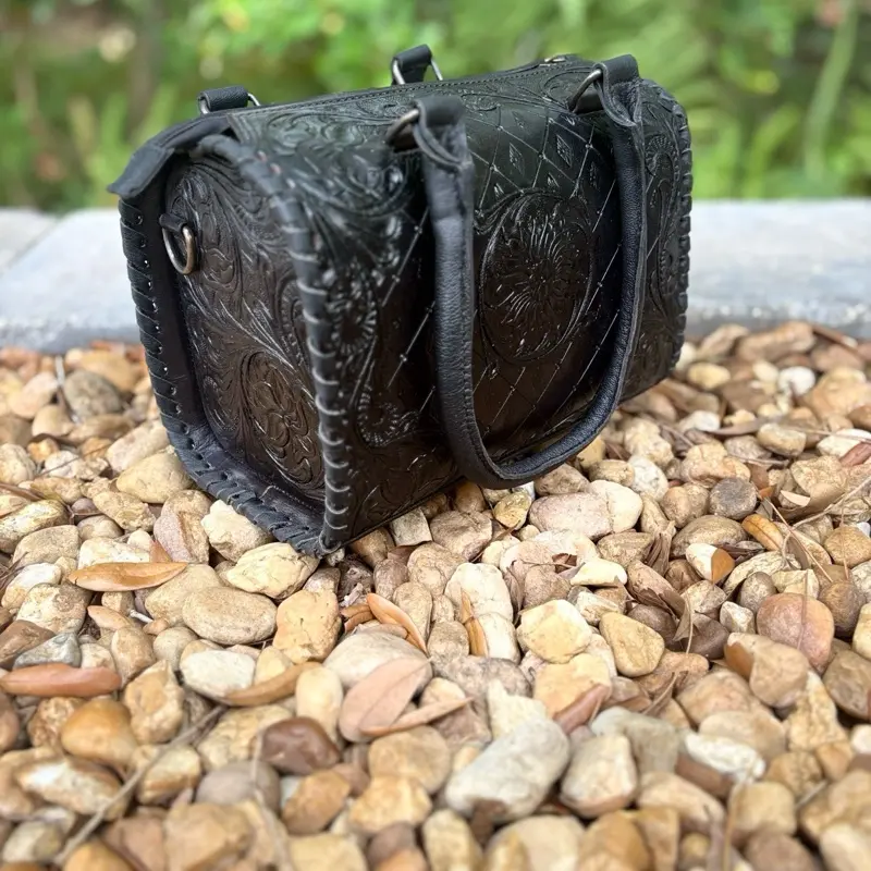 Medium black floral tooled leather design Speedy Crossbody Purse.