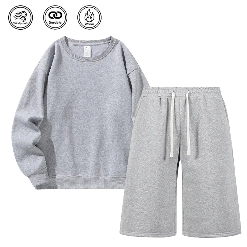 Men’s loose-fit crewneck two-piece athletic set featuring a breathable, comfortable solid-color long-sleeve sweatshirt paired with drawstring seven-eighths-length joggers; casual, trendy street style that’s versatile, suitable as a birthday or holiday gif