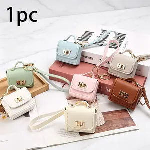 Fashionable High-End Leather Keychain Wallet Mini Coin Purse, Creative Personalized Earphone Small Bag, Stylish Accessory for Daily Use