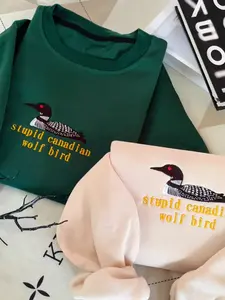 Embroidered Stupid Canadian Wolf Bird Sweatshirt, Hockey Romance Crewneck, LGBT Hockey Fan Gift, Heated But Devote Team Hollanov Sweatshirt