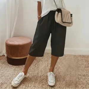 New summer women’s casual pants featuring Tencel fabric, two pockets, and a drawstring; suitable for everyday wear, loose and comfortable.