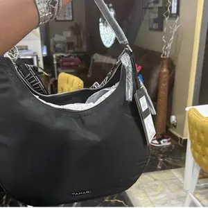 Tahari Black Hobo Bag with Pattern Strap - Stylish and Functional Shoulder Bag for Everyday Use