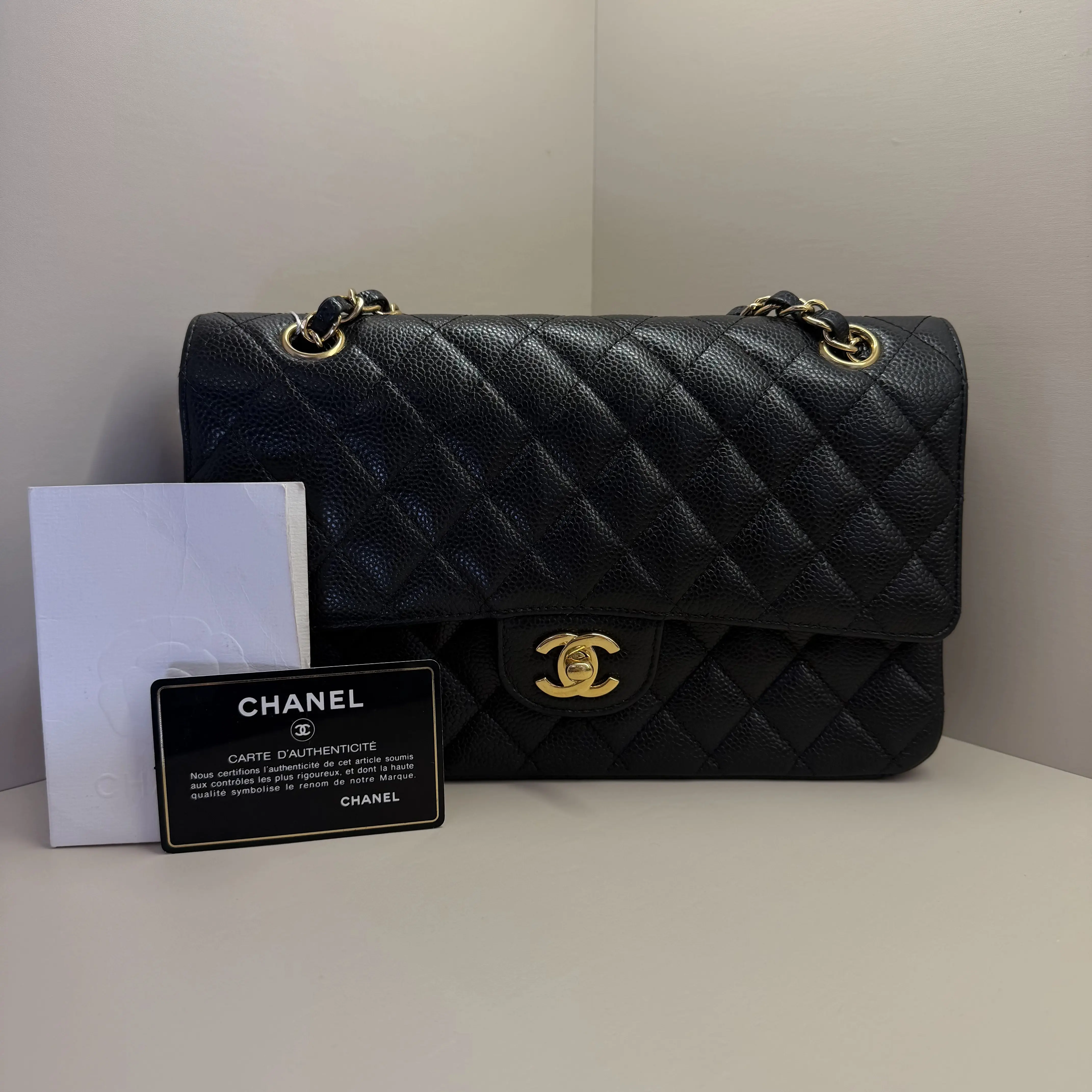 Pre-owned CHANEL Medium Classic Flap Bag, Black Caviar Grained Calfskin with Vintage Gold Tone Hardware (Serial #29627065, Circa 2019 2020, Made in France)A170 HK