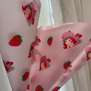 Pink Strawberry Flower Wrapping Paper with Adorable Character Design for Festive Occasions