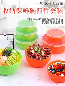 A set of four nesting food storage containers with lids, made of plastic, round in shape, suitable for outdoor use. Kitchen Utensils Colorful meal prep containers