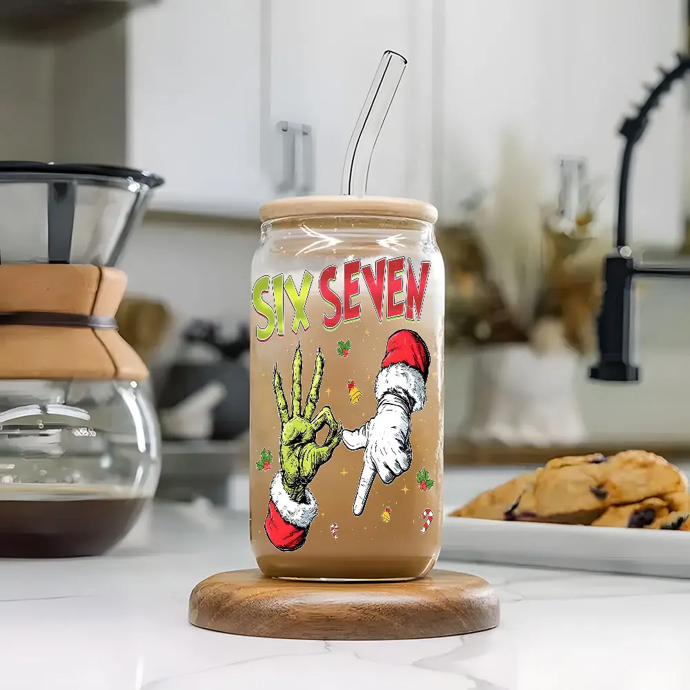 Trendy Christmas Grinch 67 Meme 16oz Glass Can Cup with Lid and Straw, Reusable Glass Drinking Cup, High-Quality Glass Jar for Iced Coffee, Hot Chocolate, Holly & Candy Cane Design Festive Glassware, Perfect Gift for Christmas Lovers