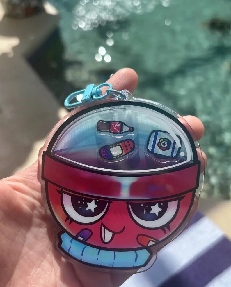 Gigi dandys world shaker keychain. Gigi dandys world shaker keychain.