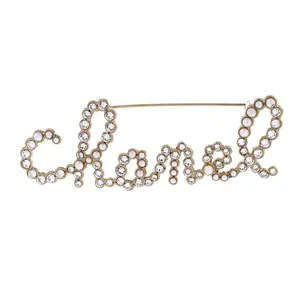 Pre-owned Chanel Swirling Logo Brooch Metal with Crystal and Faux Pearls by Rebag