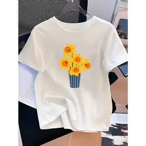 Women's floral print with daffodils in a blue vase Graphic T-Shirt -       Short Sleeve Crew Neck Regular Fit Casual Wear | Soft & Breathable Fabric, Durable Print, Everyday Comfort, Machine Washable, minimalistic and casual indoor lifestyle