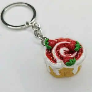 Handcrafted Strawberry Cinnamon Roll Keychain - Sweet Dessert Design with Realistic Strawberries & Icing Detailing - Perfect Gift for Keys or as a Delightful Accessory