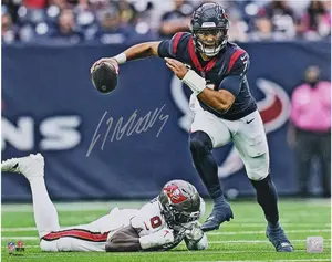 C.J. Stroud Houston Texans Autographed 16" x 20" Escape from Pocket Photograph - Fanatics Authentic Certified