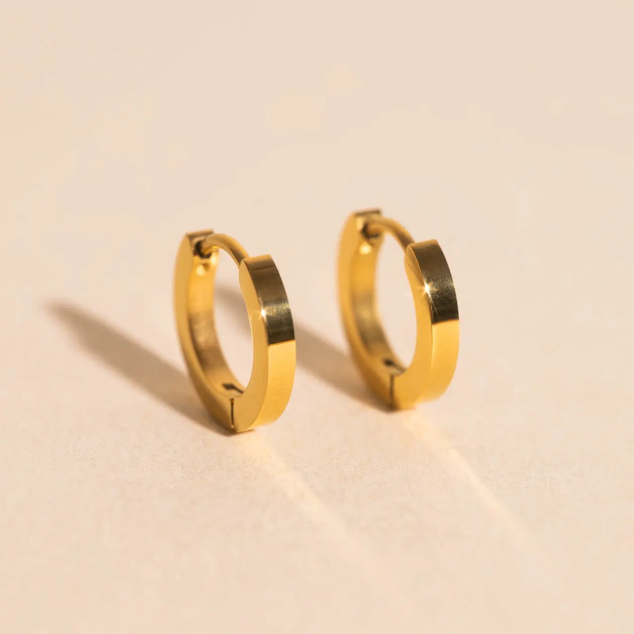 O.G. Smooth Huggie Hoop Earrings