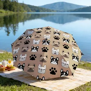 Portable folding umbrella The umbrella features patterns of cartoon bulldog faces in various colors and black paw prints. Suitable for daily travel use, holiday Gift