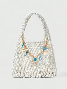 Fresh and artistic style practical texture woven handbag, embellished with starfish, seahorse, shell, pearl, chain, woven long shoulder strap, beige background, suitable for date/vacation dressing scenes