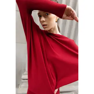 ASYMMETRICAL SWEATER WITH CUFFED SLEEVE