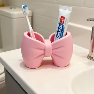 Adorable Bow-Shaped Toothbrush Holder Organizer - Cute Bow Plastic Standalone -Mounted Bathroom Accessory Suitable for Bathroom & Bedroom - Space-Saving Hygienic Toothbrush Storage