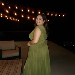 Customer wearing the Athena Gown