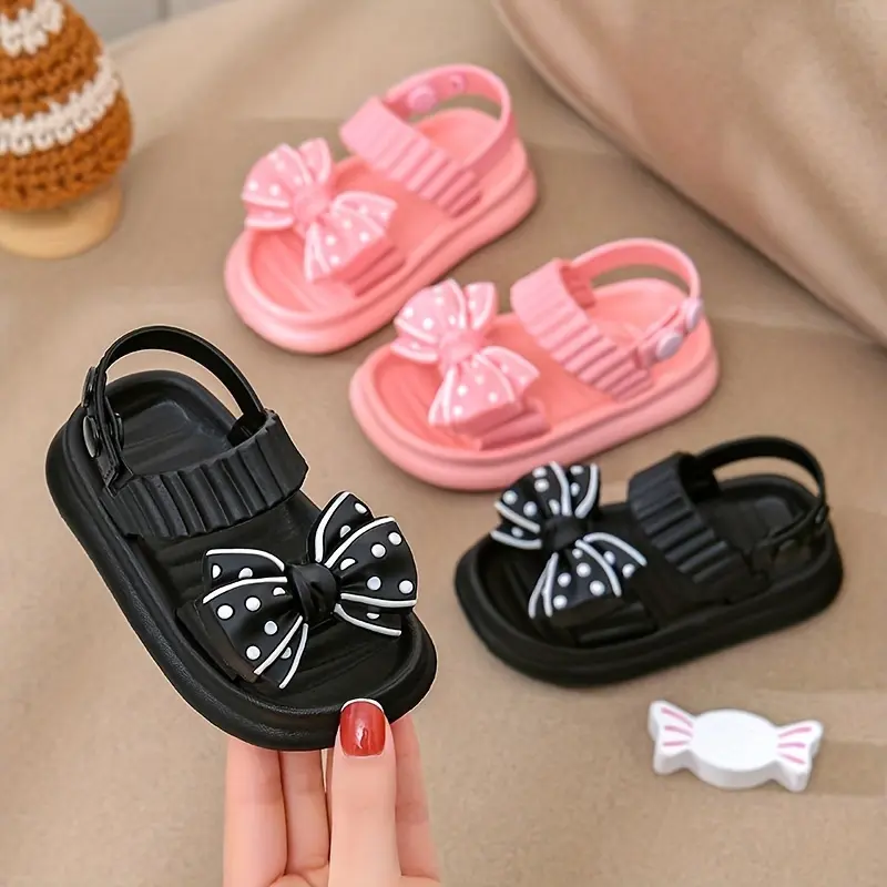 Girls' Pink Polka Dot Slip-On Plastic EVA Open Toe Princess Bow Front Sandals - Pastel Bow Decor, Soft Soles, Odor-Resistant Child Sized Non-Outdoor Footwear