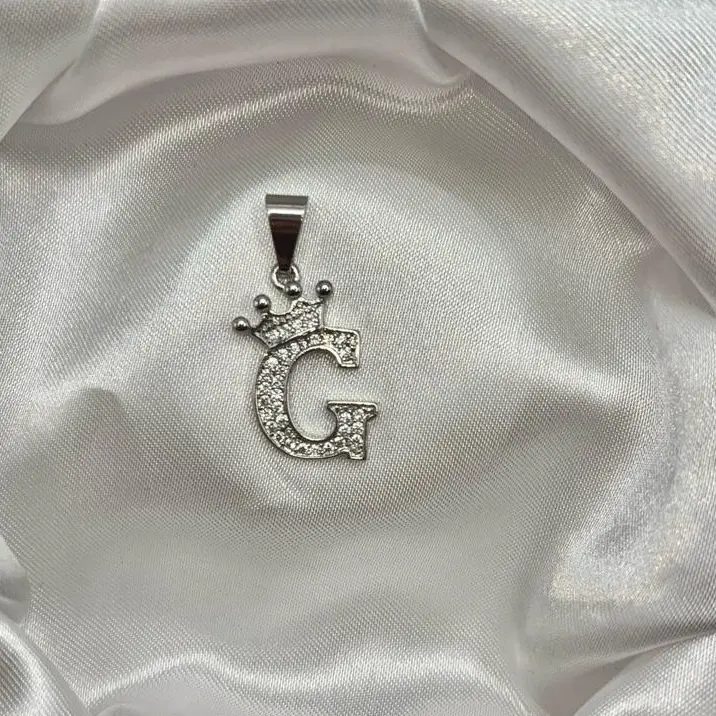 Silver plated shiny clear rhinestone initial pendant with side crown