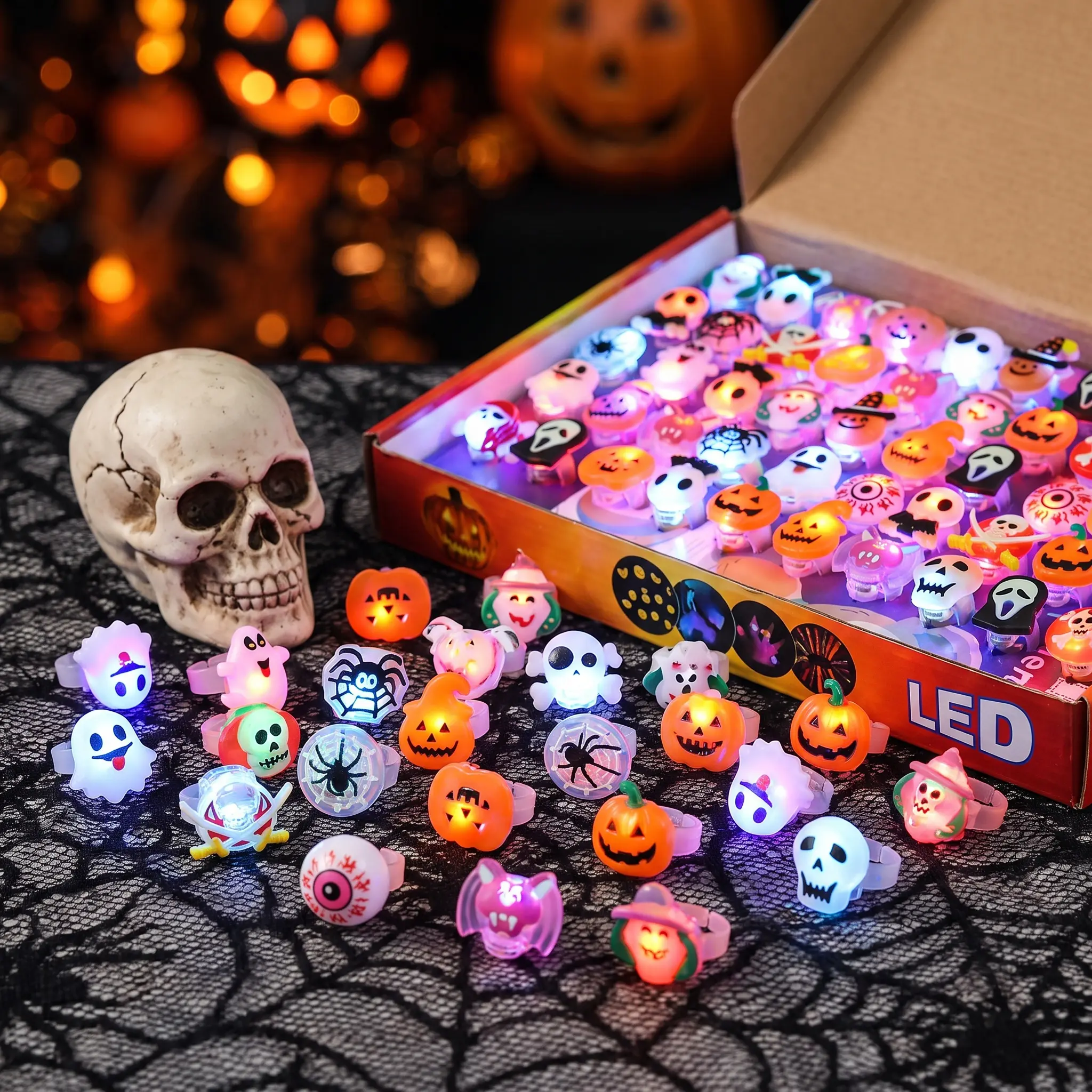 50 Pack Halloween Light Up Rings, LED Flashing Finger Rings with Pumpkin Ghost Spider Skeleton Designs, Glow In The Dark Party Favors, Kids Trick Or Treat Toys