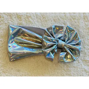 silver holographic bow