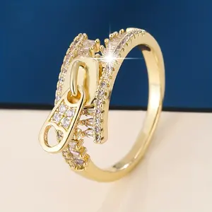 A stylish ring featuring synthetic cubic zirconia, a copper base, a unique coating, and an elegant zipper design, suitable for daily wear and as a gift Bear Necklace Stainless Steel Cuban Link Large Pearl Saturn Water Drop Choker Pendant safety pin
