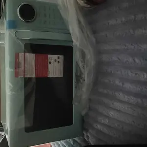 Nostalgia Retro 700W Microwave Oven – 0.7 Cu Ft Capacity