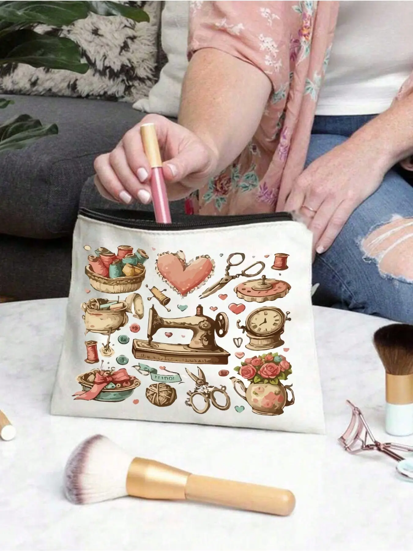 Sewing themed women's toiletry bag. Lightweight fabric makeup pouch with zipper closure. Featured stylish sewing pattern, great for daily use and travel. Perfect for camping, business trips and school use, ideal back-to-school and vacation essential.