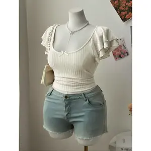 Fashionable and elegant plus-size T-shirt made from breathable fabric, featuring ruffled sleeve edges and a square neckline, designed to flatter women’s figures and reflect current fashion trends.