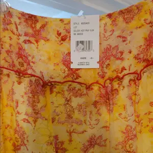 Cynthia Steffe Ladies size 6 skirt, yellow lining and back ground with hot pink design and embroidery detailing. brand new, never been worn, and very comfortable when i tried on to purchase.