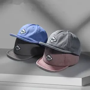 A Basic Stylish Baseball Cap for Men, Featuring a Japanese Workwear Retro Washed Look with a Short Brim, Suitable for Hip-Hop Street Fashion, Including a Flat-Brimmed Trucker Hat.
