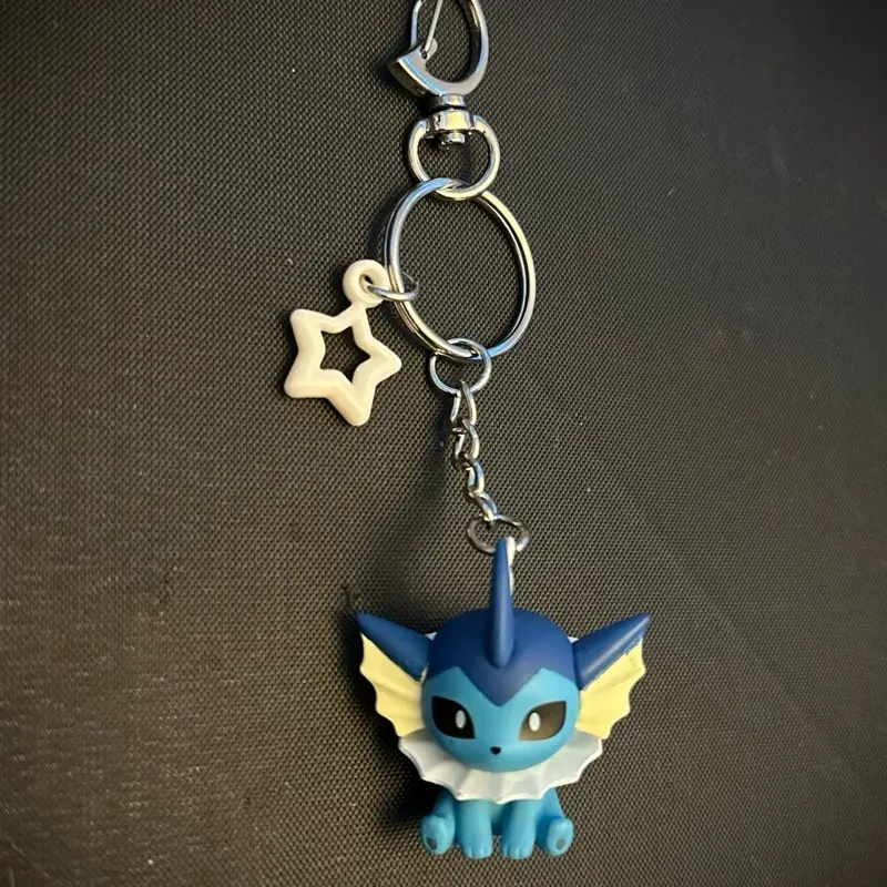 Chibi Vaporeon Keychain with Clip - Blue Character Design, Yellow Eyes, and White Detail, Includes Clip Attachment