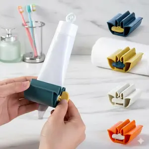 Universal Toothpaste Squeezer Mount: Dual-Holder Space-Saving Organizer, Strong Adhesive Wall-Mounted Dispenser for Tubes, Effortless Roller Tool, Anti-Slip & Water-Resistant Bathroom Storage Solution.